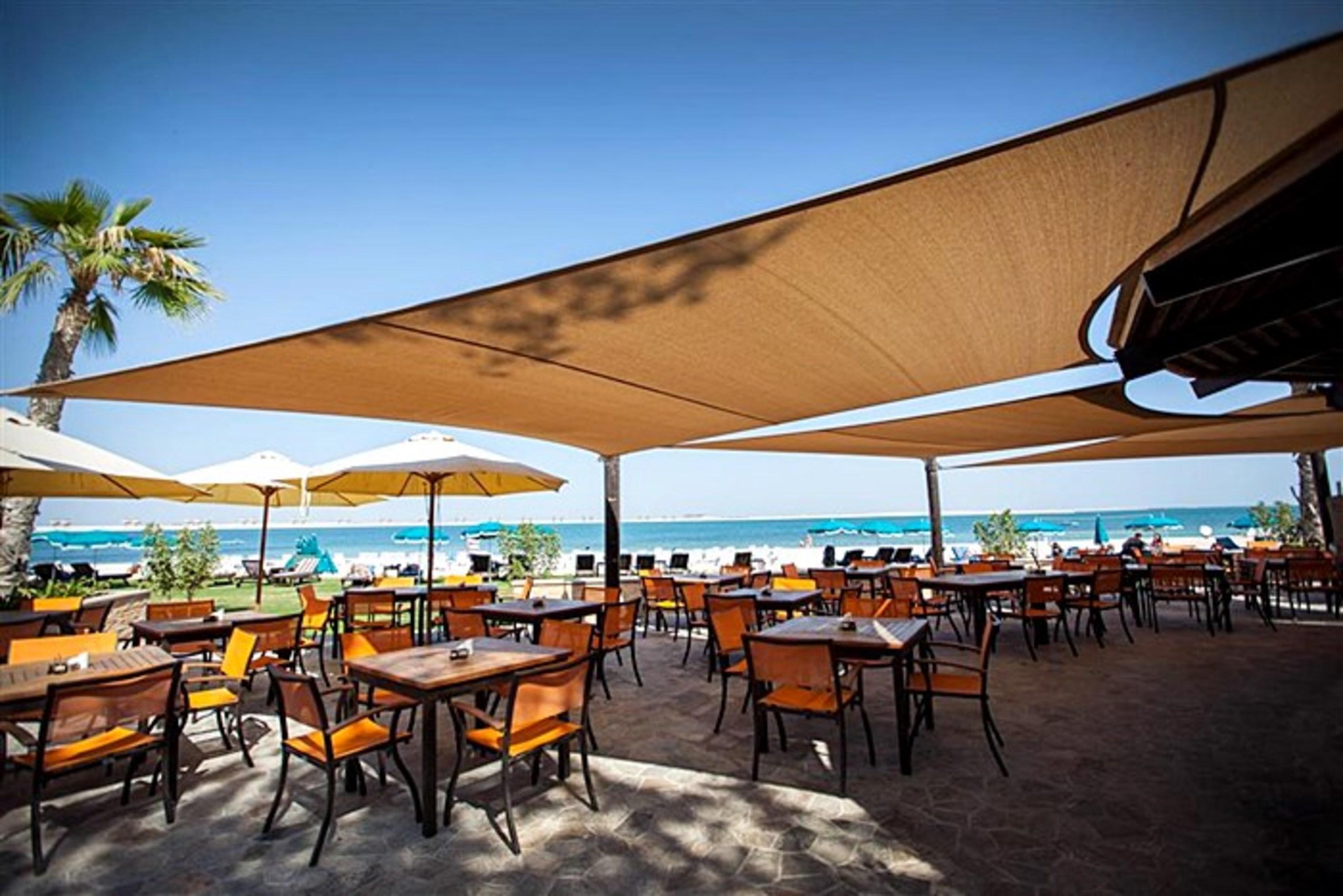 Ja The Resort - Ja Beach Hotel, Dubai Exterior photo Beachfront restaurant