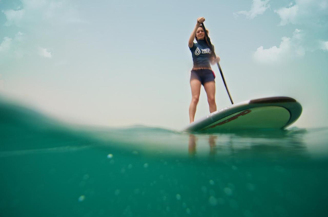 Ja The Resort - Ja Beach Hotel, Dubai Exterior photo Stand up paddle boarder